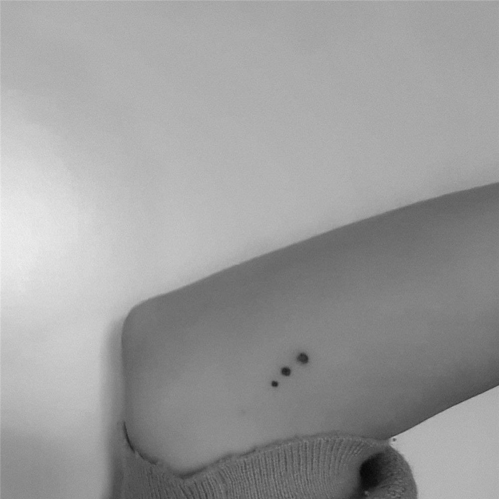 3 vertical dots tattoo meaning